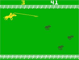 In game image of Stampede on the Mattel Intellivision.