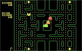 In game image of Pac Man on the Microsoft DOS.