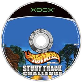 Artwork on the CD for Hot Wheels: Stunt Track Challenge on the Microsoft Xbox.