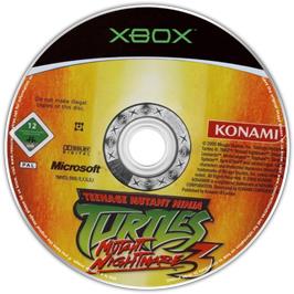 Artwork on the CD for Teenage Mutant Ninja Turtles 3: Mutant Nightmare on the Microsoft Xbox.
