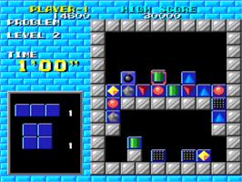 In game image of Puzznic on the NEC PC Engine.