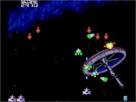 In game image of Galaga '90 on the NEC TurboGrafx-16.