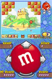 In game image of M&M's Break' Em on the Nintendo DS.