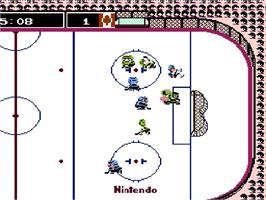 In game image of Ice Hockey on the Nintendo Famicom Disk System.