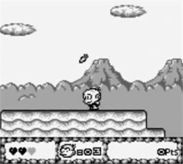 In game image of Bonk's Adventure on the Nintendo Game Boy.
