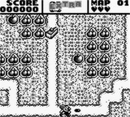 In game image of Mr. Do! on the Nintendo Game Boy.