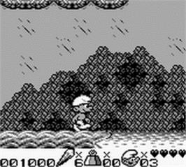 In game image of Smurfs Travel the World on the Nintendo Game Boy.