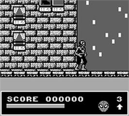 In game image of Spider-Man and the X-Men: Arcade's Revenge on the Nintendo Game Boy.