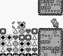 In game image of Tetris Attack on the Nintendo Game Boy.
