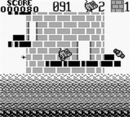 In game image of Tower Toppler on the Nintendo Game Boy.