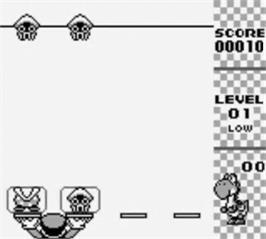 In game image of Yoshi on the Nintendo Game Boy.