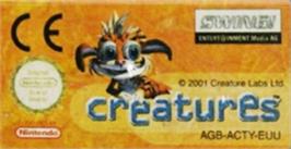Top of cartridge artwork for Creatures on the Nintendo Game Boy Advance.