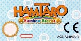 Top of cartridge artwork for Hamtaro Rainbow Rescue on the Nintendo Game Boy Advance.