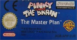 Top of cartridge artwork for Pinky and the Brain: The Master Plan on the Nintendo Game Boy Advance.