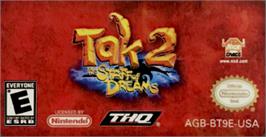 Top of cartridge artwork for Tak 2: The Staff of Dreams on the Nintendo Game Boy Advance.