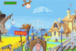 In game image of Chicken Shoot on the Nintendo Game Boy Advance.