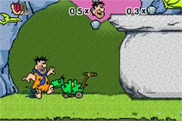 In game image of Flintstones: Big Trouble in Bedrock on the Nintendo Game Boy Advance.