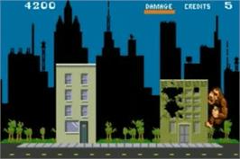 In game image of Paperboy / Rampage on the Nintendo Game Boy Advance.