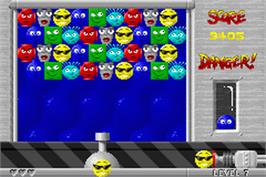 In game image of Snood on the Nintendo Game Boy Advance.