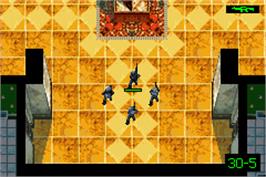 In game image of Tom Clancy's Rainbow Six: Rogue Spear on the Nintendo Game Boy Advance.
