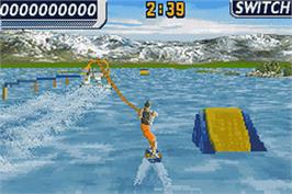 In game image of Wakeboarding Unleashed featuring Shaun Murray on the Nintendo Game Boy Advance.