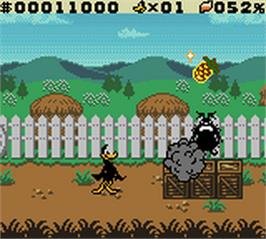In game image of Daffy Duck: Fowl Play on the Nintendo Game Boy Color.