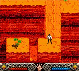 In game image of Indiana Jones and the Infernal Machine on the Nintendo Game Boy Color.