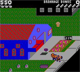 In game image of Paperboy on the Nintendo Game Boy Color.