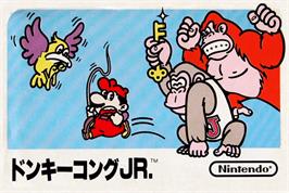 Box cover for Donkey Kong Junior on the Nintendo NES.