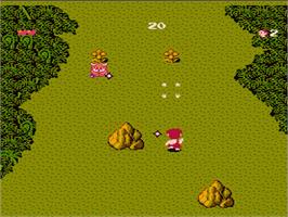 In game image of Adventures of Dino-Riki on the Nintendo NES.