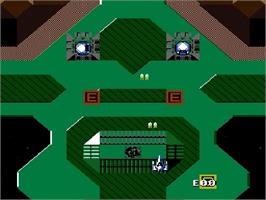 In game image of Alpha Mission on the Nintendo NES.