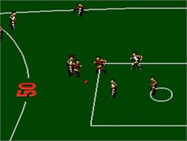 In game image of Aussie Rules Footy on the Nintendo NES.