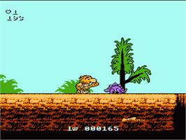 In game image of Big Nose the Caveman on the Nintendo NES.