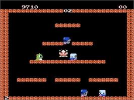 In game image of Bubble Bobble on the Nintendo NES.