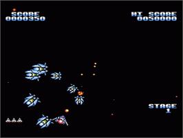 In game image of Gyruss on the Nintendo NES.