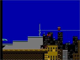In game image of Hudson Hawk on the Nintendo NES.