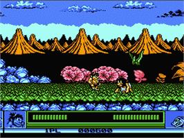 In game image of Joe & Mac: Caveman Ninja on the Nintendo NES.