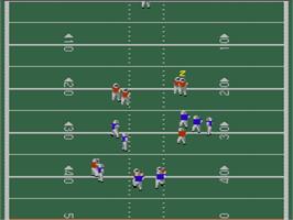 In game image of John Elway's Quarterback on the Nintendo NES.