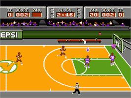 In game image of Magic Johnson's Fast Break on the Nintendo NES.