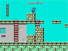 In game image of Mega Man on the Nintendo NES.