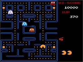 In game image of Pac-Man on the Nintendo NES.