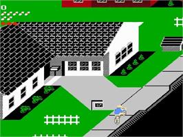 In game image of Paperboy on the Nintendo NES.