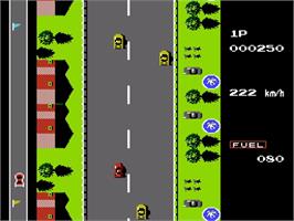 In game image of Road Fighter on the Nintendo NES.