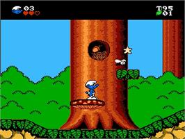 In game image of Smurfs on the Nintendo NES.