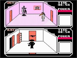 In game image of Spy vs. Spy on the Nintendo NES.