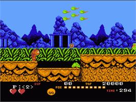 In game image of Toki: Going Ape Spit on the Nintendo NES.