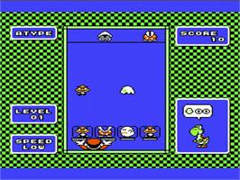 In game image of Yoshi on the Nintendo NES.