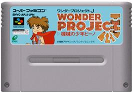 Cartridge artwork for Wonder Project J: Kikai no Shounen Pino on the Nintendo SNES.