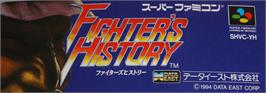 Top of cartridge artwork for Fighter's History on the Nintendo SNES.