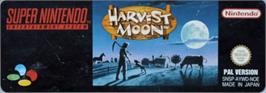 Top of cartridge artwork for Harvest Moon on the Nintendo SNES.